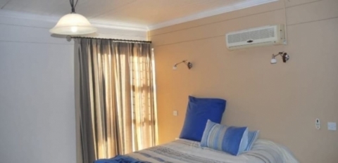 Bedroom with AC unit
